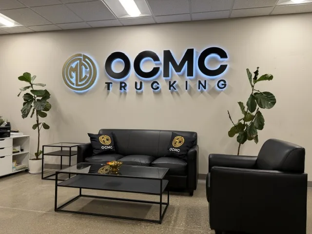 OCMC Trucking — Lobby Logo
